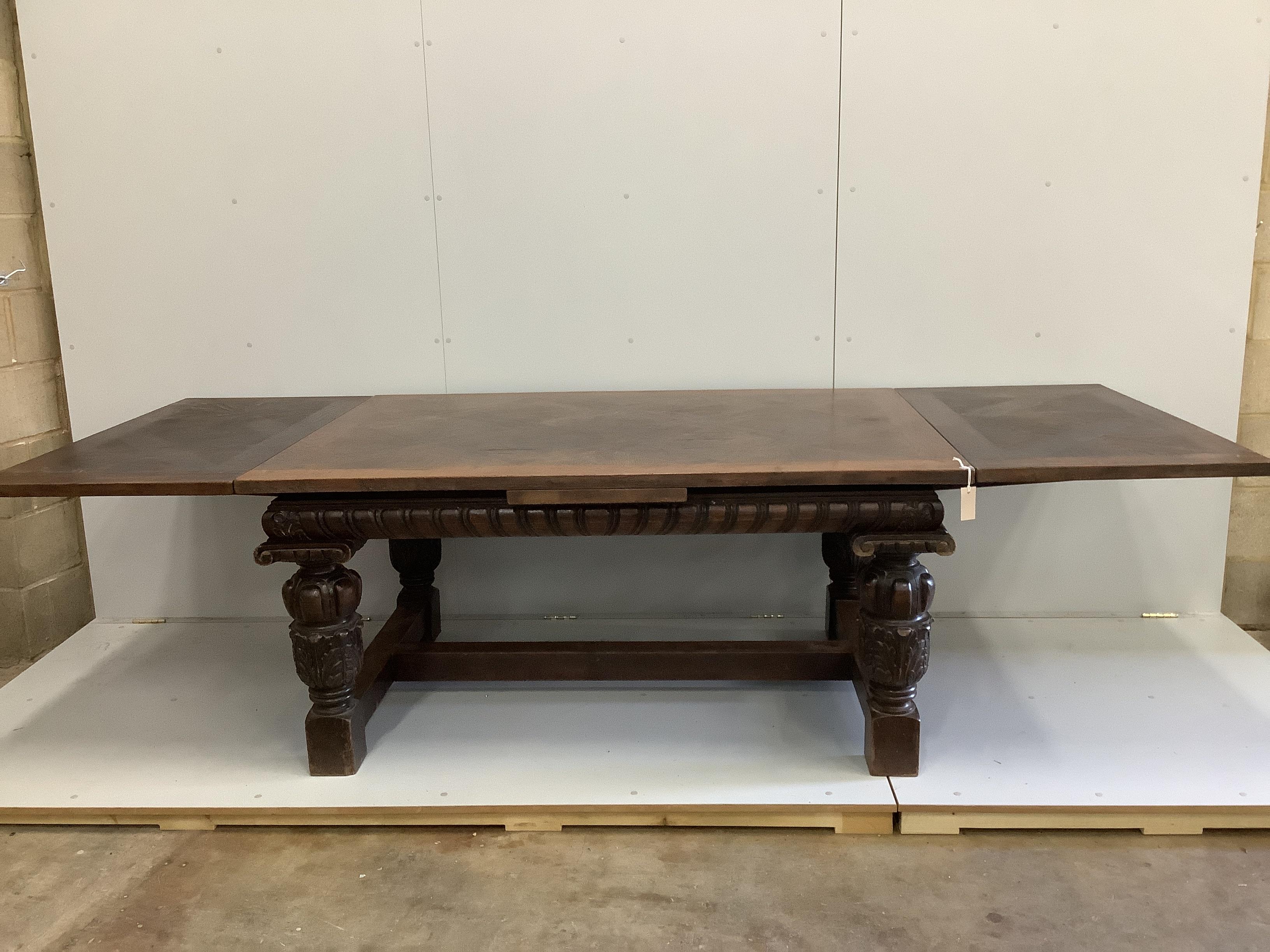 A Jacobean revival rectangular parquetry top oak draw leaf refectory dining table, 280cm extended, width 109cm, height 76cm